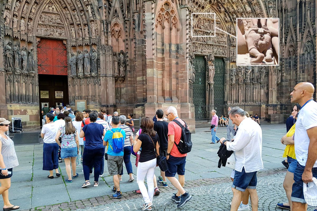 people walking to enter the cathedral