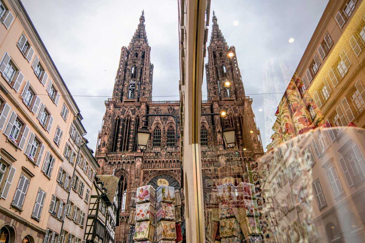 Cathedral Notre Dame of Strasbourg's second spire in a window