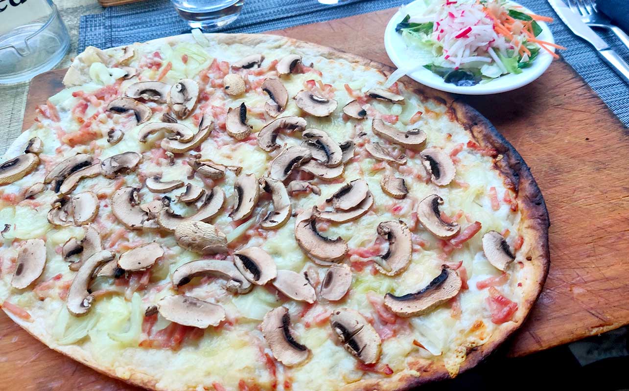 Tarte flambee with mushrooms