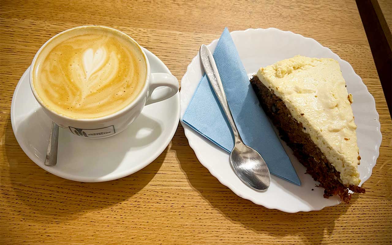 Cappuccino with a piece of carrot cake